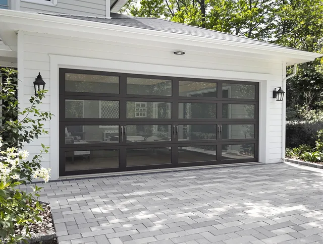 Plantation Garage Door Repair design specialist presenting custom garage door options to Plantation homeowner